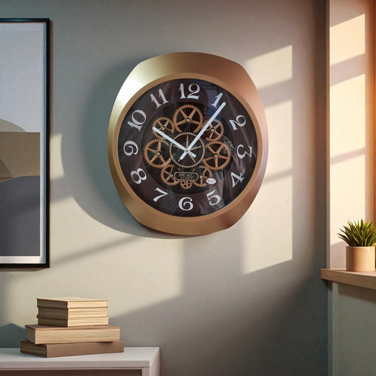 Decorative wall clock with gold frame and black face in a room setting.