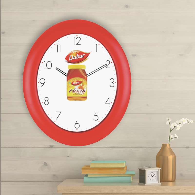 Dabur Honey - Oval Promotional Wall Clock with Revolving Logo - 14 inch x 12 inch