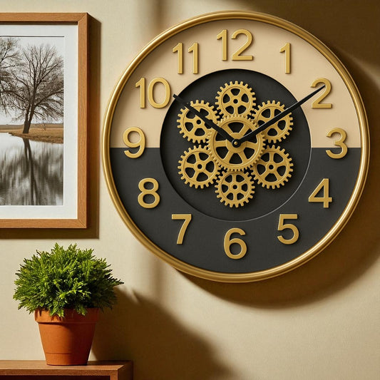 Decorative wall clock with gear design on a beige wall, next to a framed picture and plant.