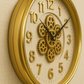 Wall clock with gear design on a beige background