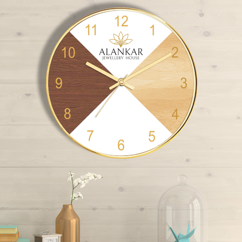 Alankar Jewelry House - 12 golden finish promotional wall clock